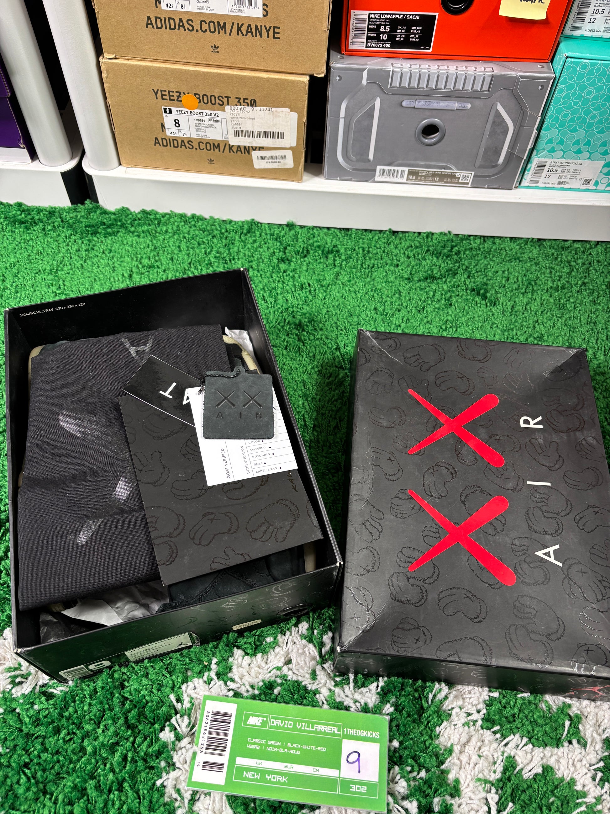 Jordan 4 Kaws Black - Size 9