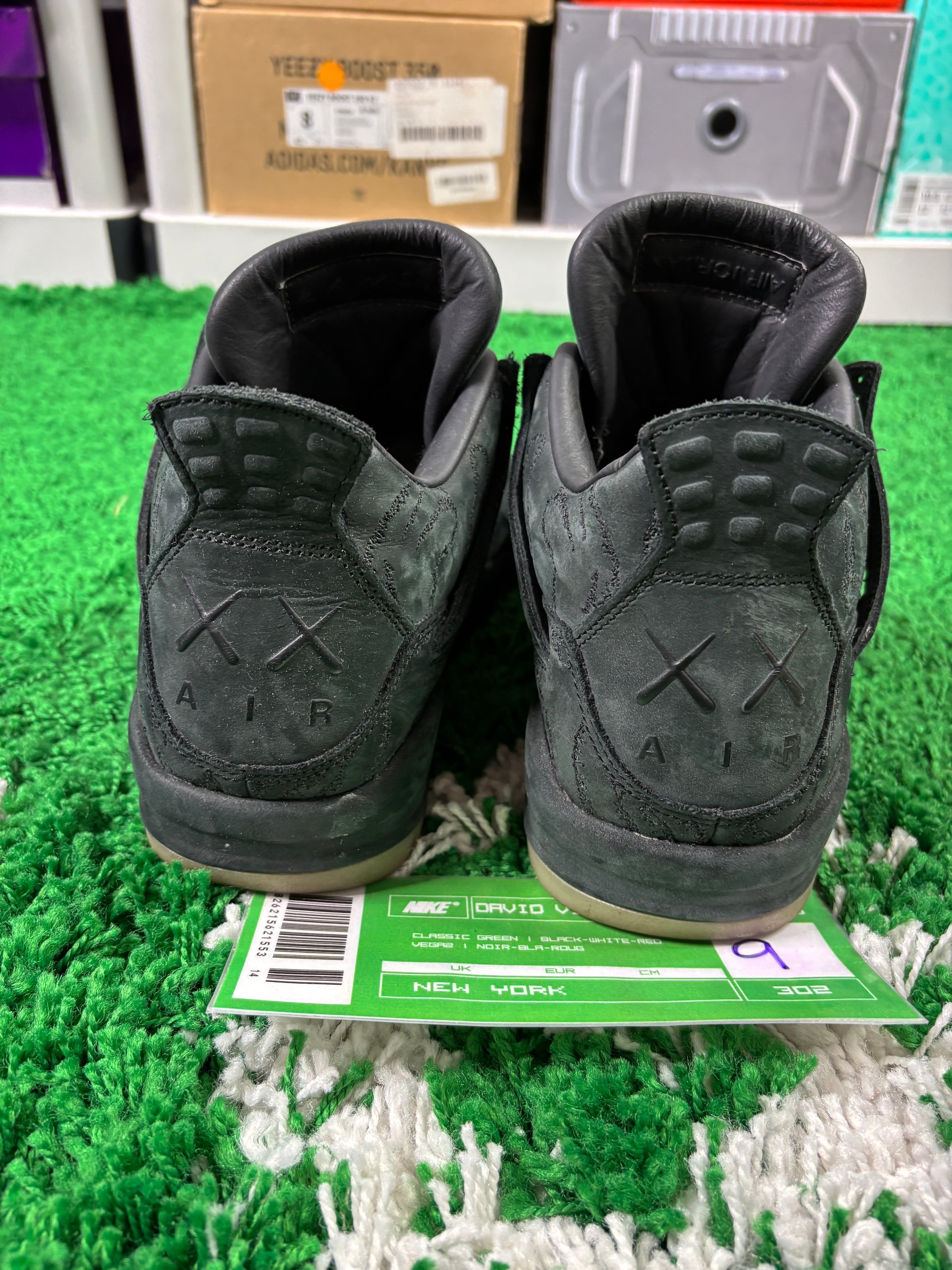 Jordan 4 Kaws Black - Size 9