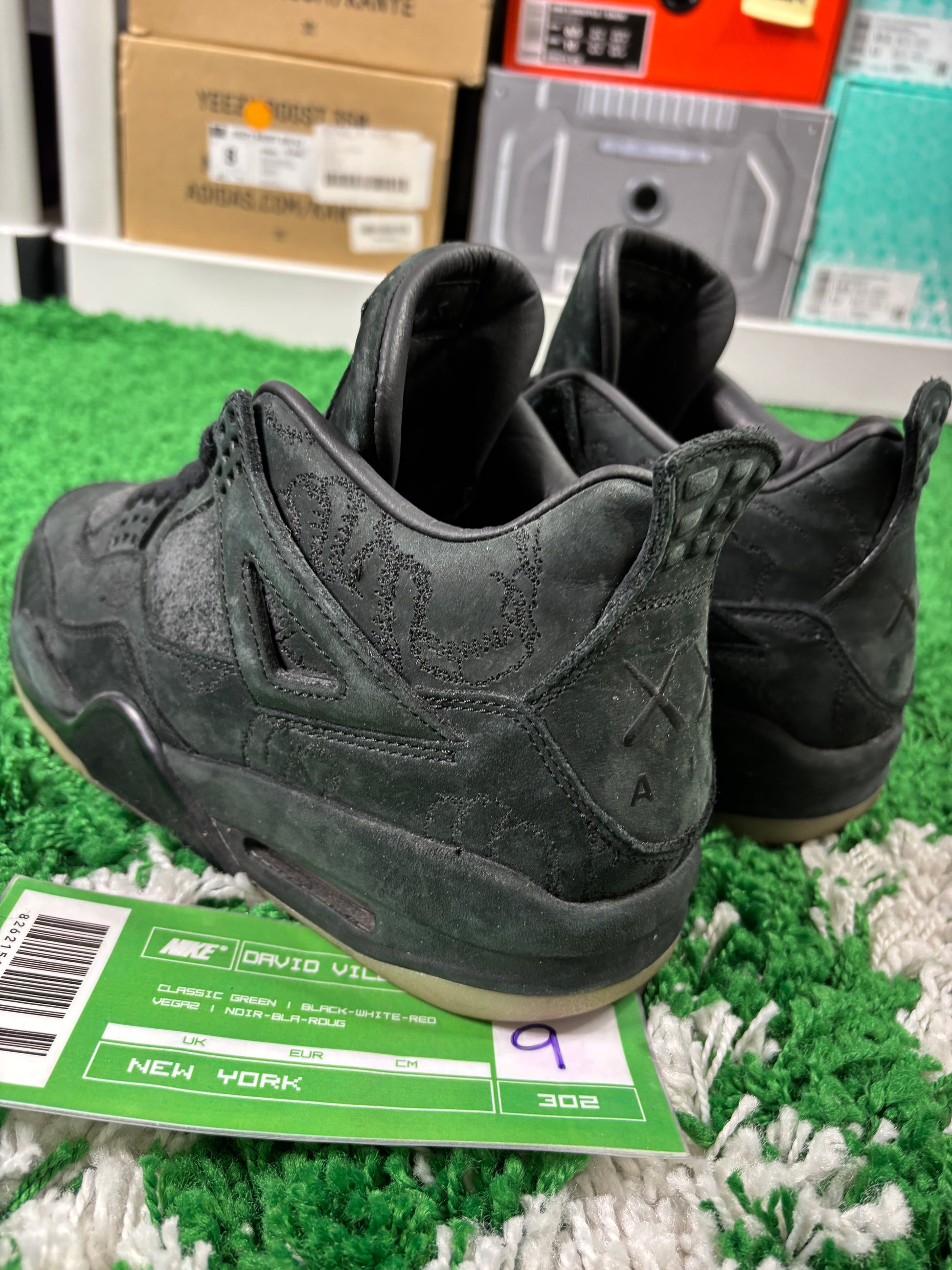 Jordan 4 Kaws Black - Size 9